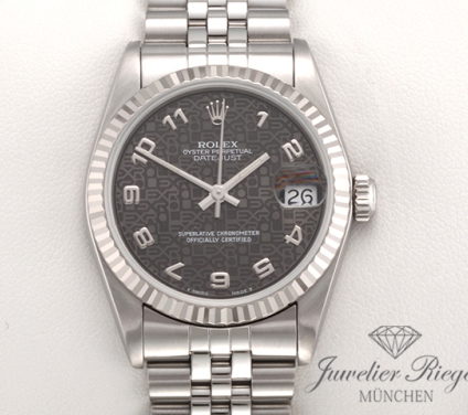 Uhransicht von vorne, hauptsächlich das Zifferblatt und die Lünette sichtbar. Rolex Medium Datejust 31 mm Stahl Weissgold 750 1997 Automatik Gold Damen