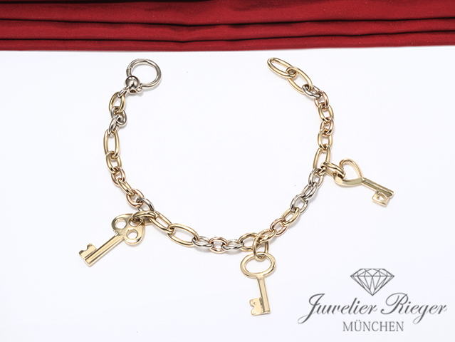 Bild 2 der Galerie: Pomellato Armband Gelbgold Weissgold Rosegold 750 3 Schlüssel Länge 22 cm Gold