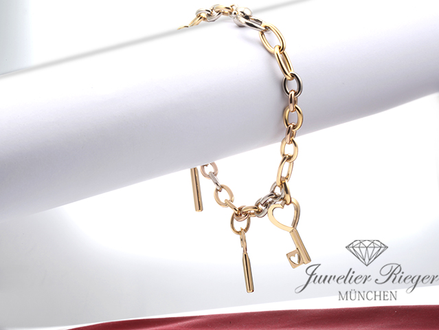 Bild 3 der Galerie: Pomellato Armband Gelbgold Weissgold Rosegold 750 3 Schlüssel Länge 22 cm Gold