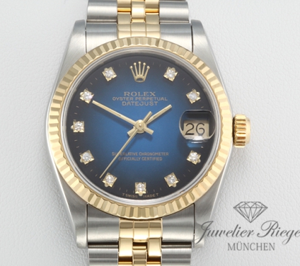 Uhransicht von vorne, hauptsächlich das Zifferblatt und die Lünette sichtbar. Rolex Medium Datejust 31 mm 68273 Stahl Gelbgold 750 Diamanten Automatik