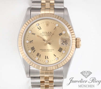 Uhransicht von vorne, hauptsächlich das Zifferblatt und die Lünette sichtbar. Rolex Medium Datejust Stahl Gelbgold 750 Diamanten Automatik Gold Stahl