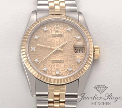 Uhransicht von vorne, hauptsächlich das Zifferblatt und die Lünette sichtbar. Rolex Medium Datejust 31 mm 68273 Stahl Gelbgold 750 Diamanten Automatik