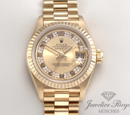 Uhransicht von vorne, hauptsächlich das Zifferblatt und die Lünette sichtbar. Rolex Lady Datejust Gelbgold 750 Diamanten Automatik Gold Damen