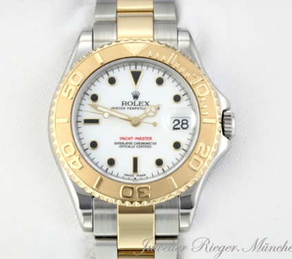 Uhransicht von vorne, hauptsächlich das Zifferblatt und die Lünette sichtbar. Rolex Medium Yachtmaster 35 mm 168623 2003 Edelstahl Gelbgold 750 Automatik Gold