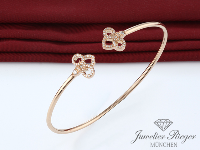 Bild 1 der Galerie: Tiffany & Co. Armreif Keys Fleur de Lis Rosegold 750 Gr Medium Diamanten 0,12 ct