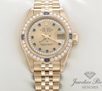 Uhransicht von vorne, hauptsächlich das Zifferblatt und die Lünette sichtbar. Rolex Lady Datejust Gelbgold 750 1994 69088 Diamanten Saphire Automatik Gold