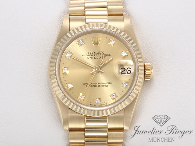Uhransicht von vorne, hauptsächlich das Zifferblatt und die Lünette sichtbar. Rolex Medium Datejust 31 mm Gelbgold 750 Diamanten Automatik Gold Damen
